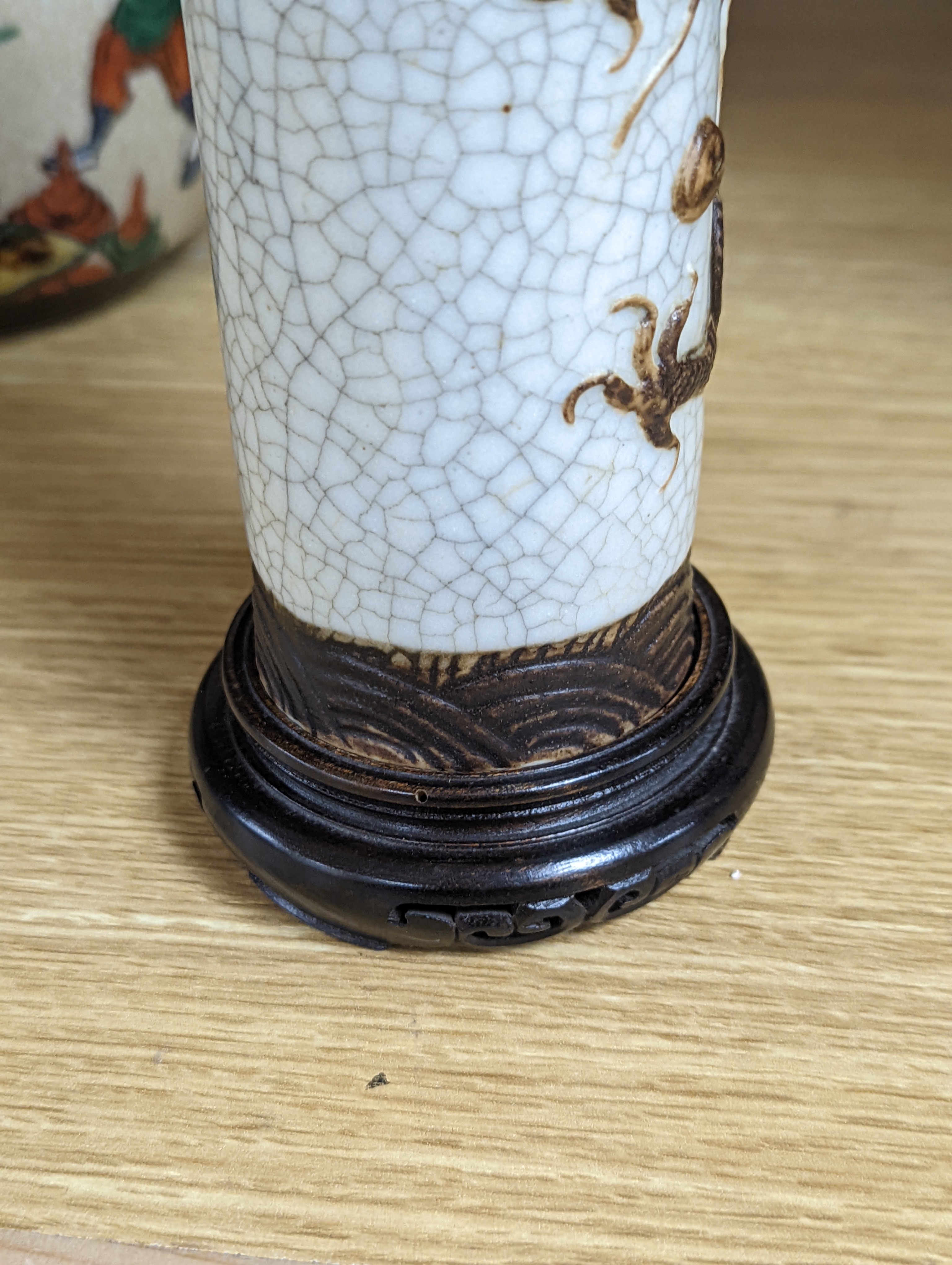 A Chinese famille verte crackle glaze jar and cover, 14.5cm, two famille rose dishes and a crackle glaze ‘dragon’ vase, all late 19th/early 20th century